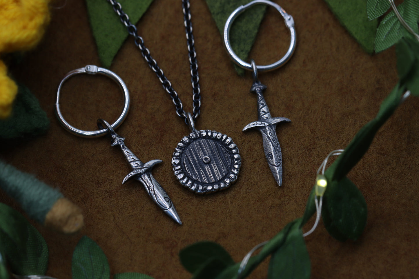 Sting short-sword earrings from The Lord of the Rings and a Hobbit Door Necklace