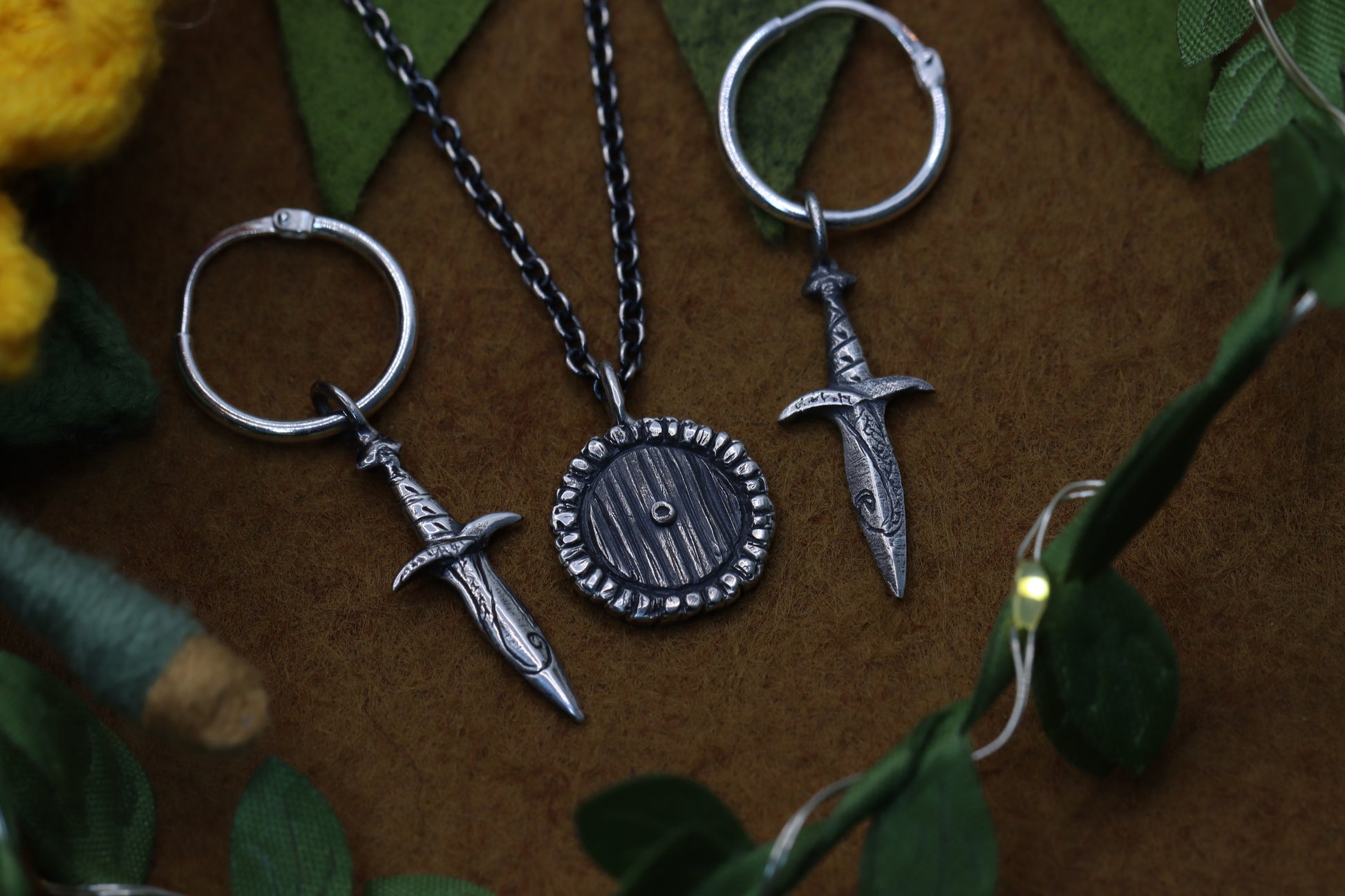 Sting short-sword earrings from The Lord of the Rings and a Hobbit Door Necklace