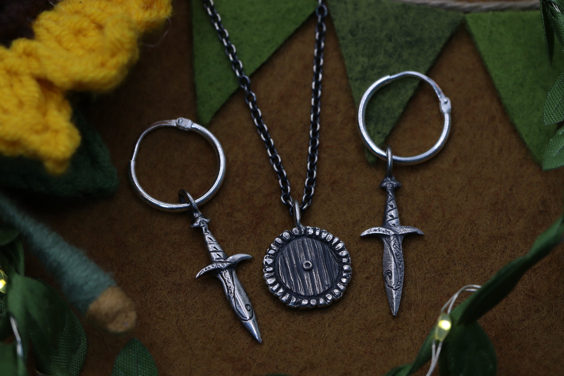 Sting short-sword earrings from The Lord of the Rings and a Hobbit Door Necklace