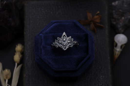 Silver Firekeepers Ring on a dark background